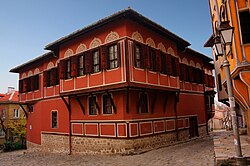 Orange Revival-era house on a cobbled street in Old Plovdiv